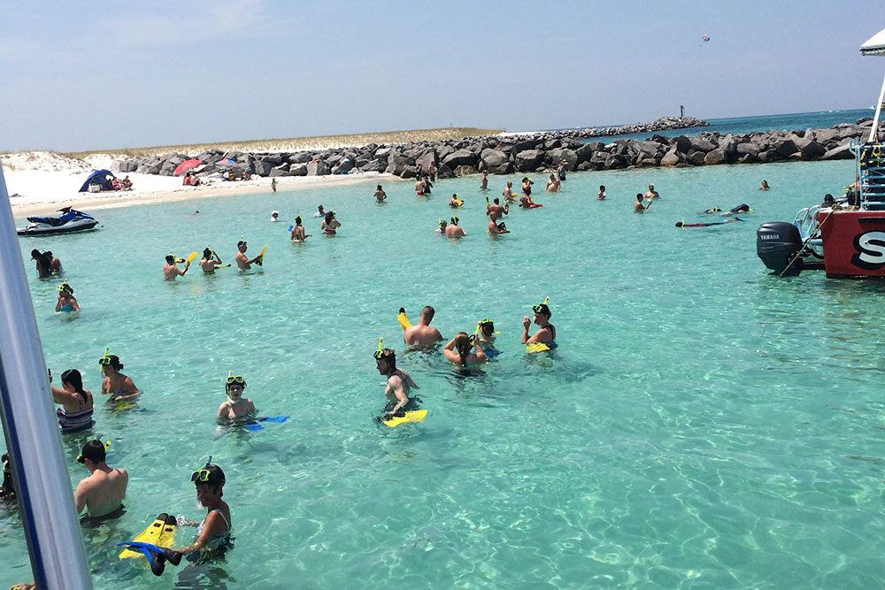 Imag of people snorkeling at Crab Island Destin Fl